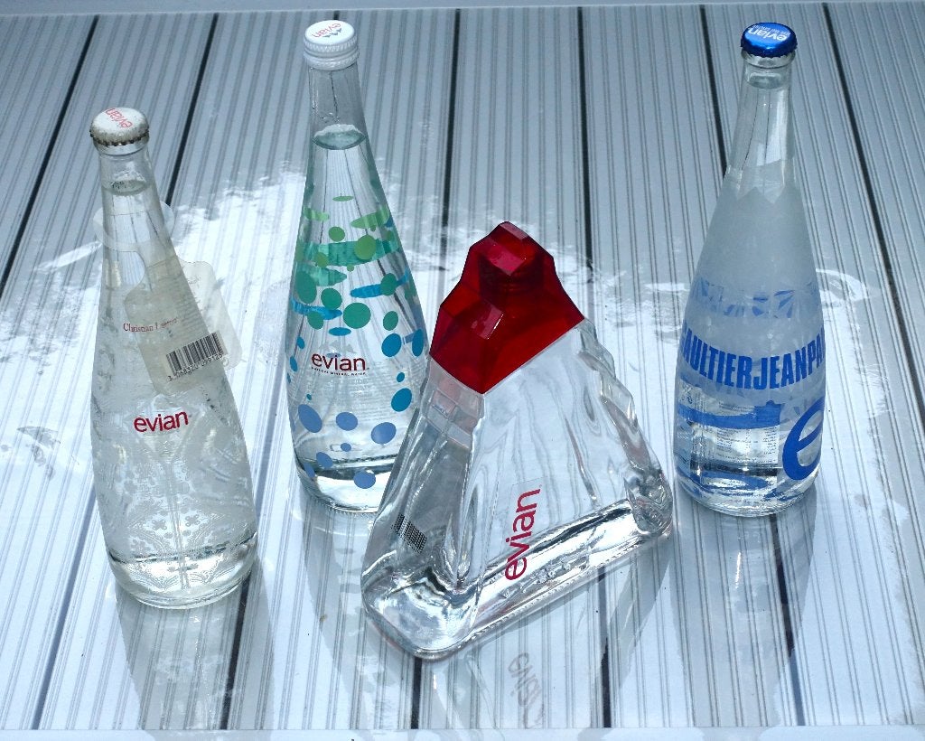 waterflessen van EVIAN, Ophalen of Verzenden, Zo goed als nieuw, Overige materialen