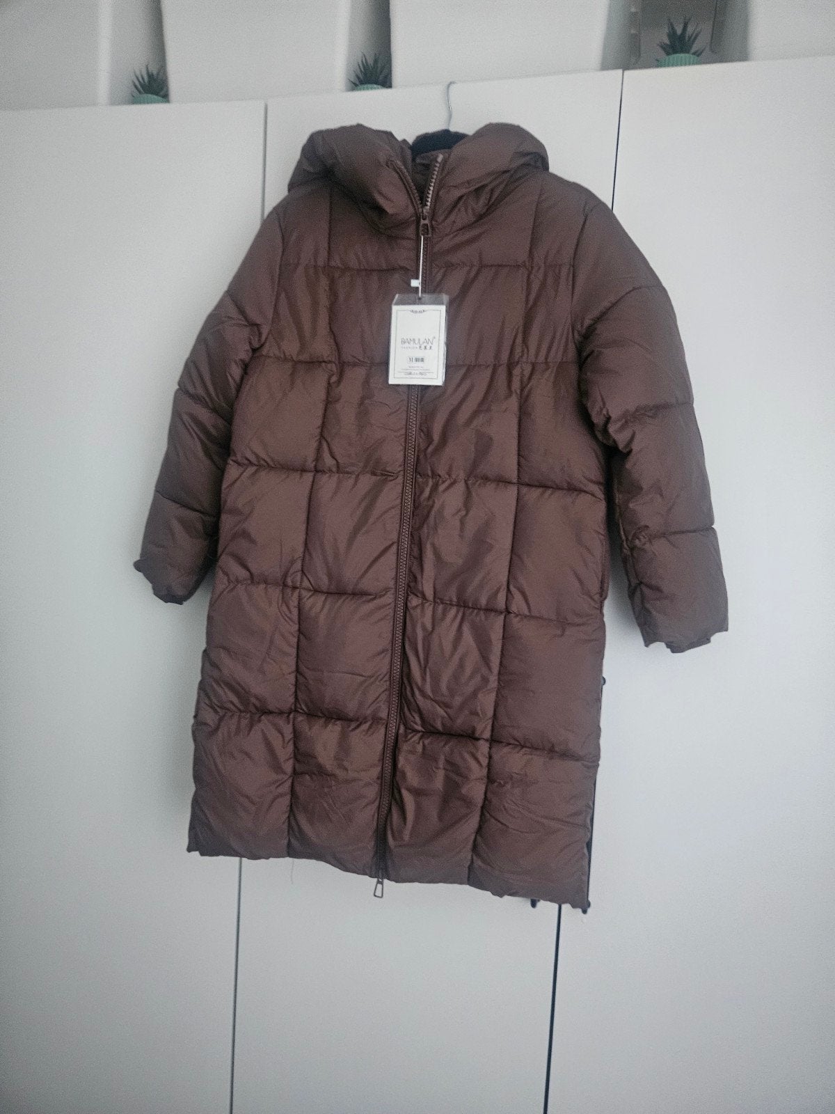 Lange bruine winterjas met capuchon - Maat 38, Kleding | Dames, Ophalen of Verzenden, Nieuw, Maat 38/40 (M), Bruin
