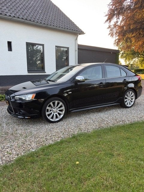 Mitsubishi Lancer 1.8 Sportback Intense 2009 Zwart, Auto's, 1330 kg, Zwart, Zwart, Leder