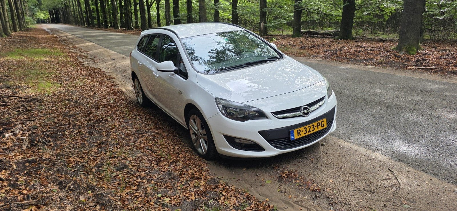 Opel Astra J Sports Tourer 1.4 benzine, 2016 Wit, Auto's, Stof, 100 pk, 14 km/l, Stationwagon