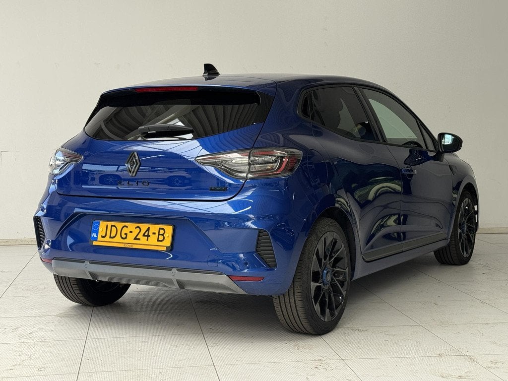 Renault Clio 1.6 E-Tech Full Hybrid 145 Esprit Alpine | Acht, Auto's, Renault, Gebruikt, Met garantie (alle), Blauw, Leder en Stof