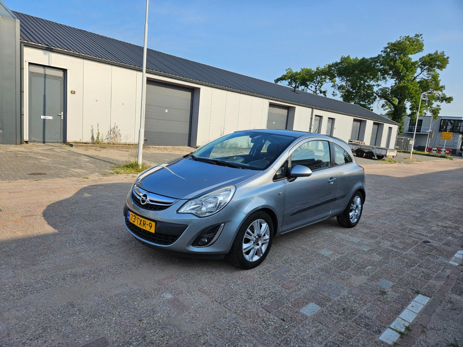 Opel Corsa 1.2 16V LPG 3D 2012 Grijs, Voorwielaandrijving, 4 cilinders, Origineel Nederlands, Handgeschakeld