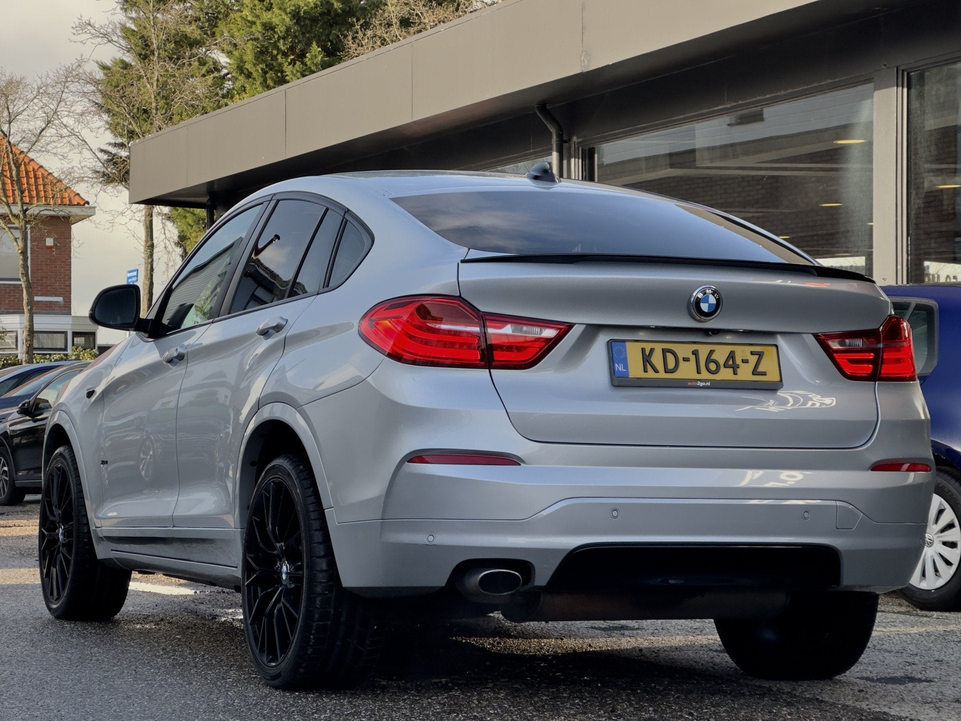BMW X4 xDrive20i 184PK AUT8 EXECUTIVE M-SPORT LEDER NAVI AIR, Gebruikt, 2000 kg, Leder en Stof, X4