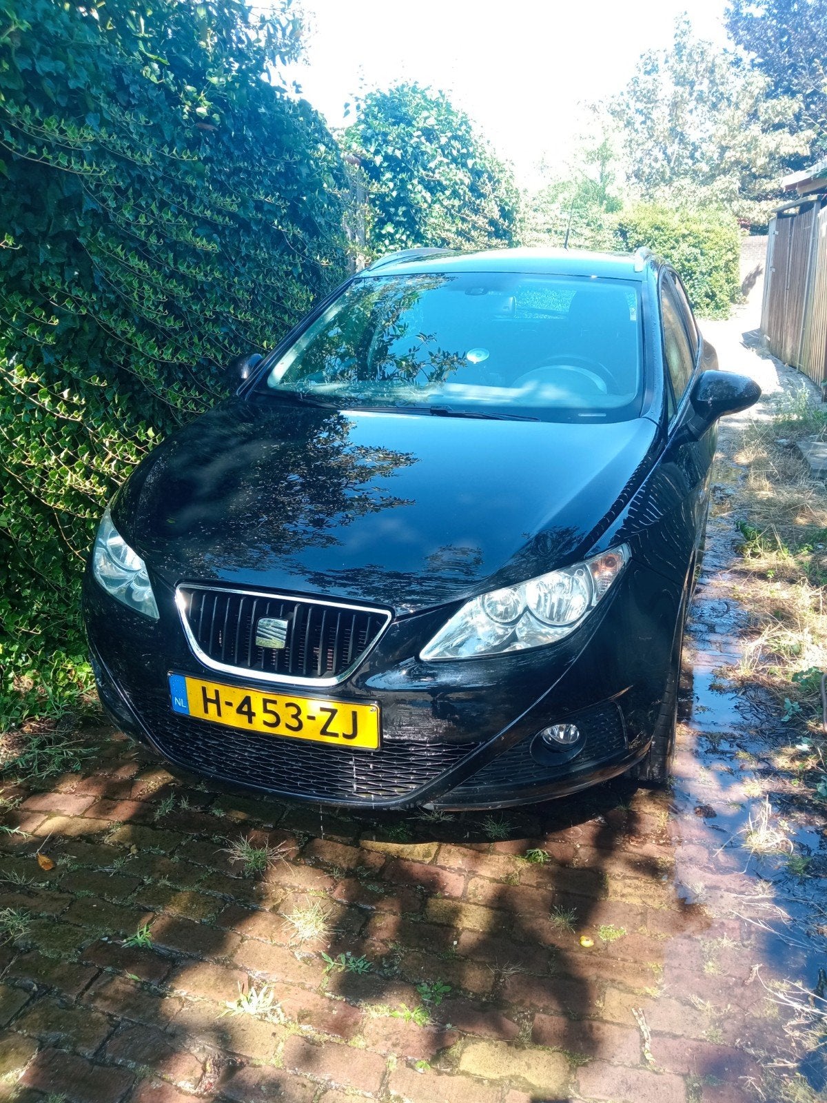 Seat Ibiza 1.2 51KW ST 2011 Zwart, Auto's, Voorwielaandrijving, 40 €/maand, 1198 cc, 1010 kg