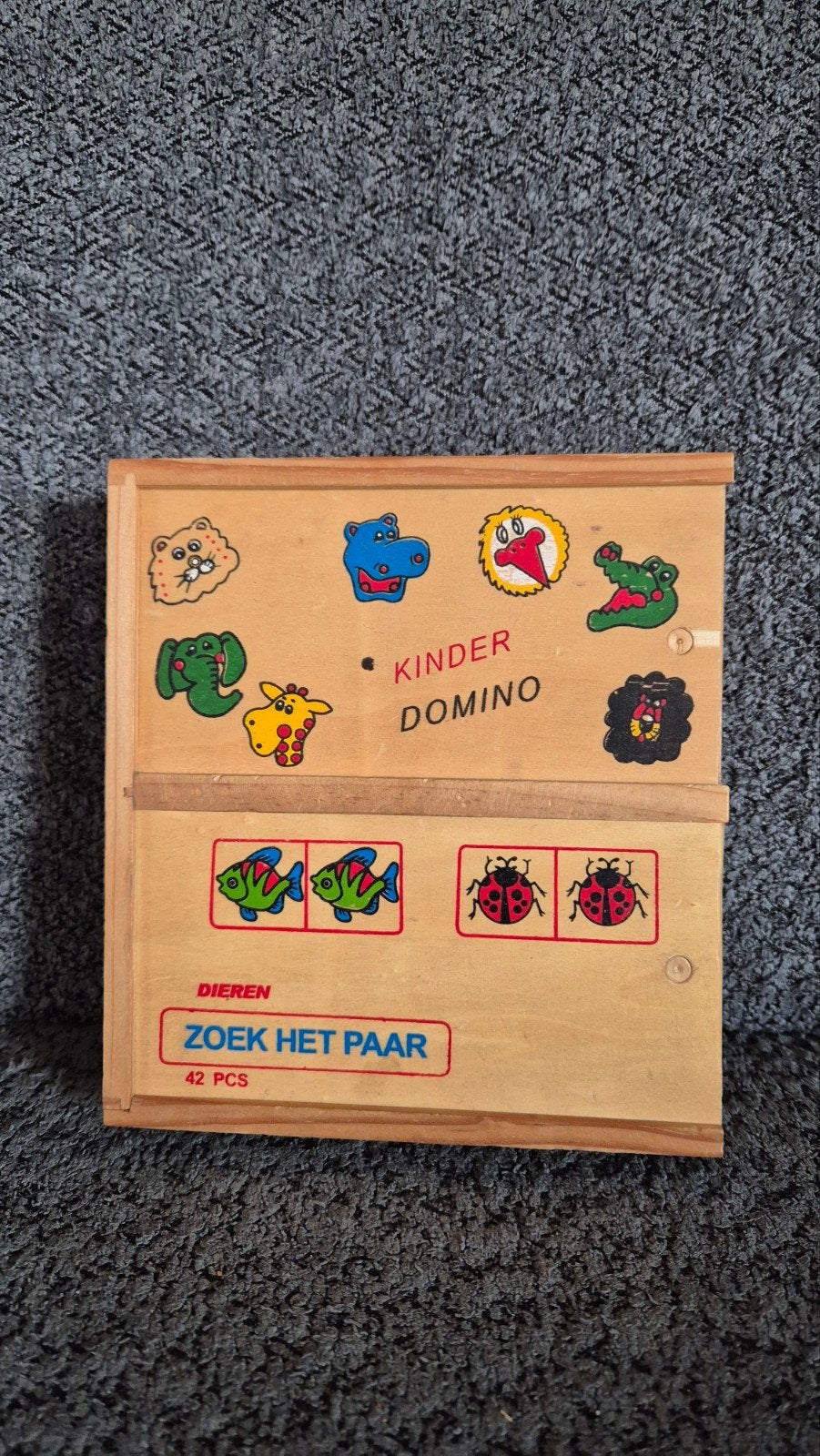 Houten domino, Ophalen