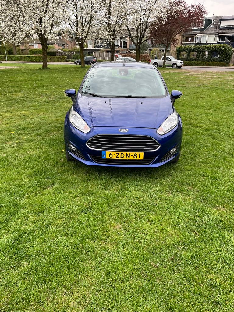Ford Fiësta titanium 1.6 Tdci 5DR 2014 Blauw, Auto's, Voorwielaandrijving, Stof, Origineel Nederlands, Grijs