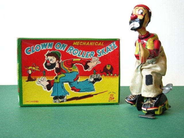 TPS schaatsende clown blik speelgoed in doos, Antiek en Kunst, Antiek | Speelgoed, Ophalen of Verzenden