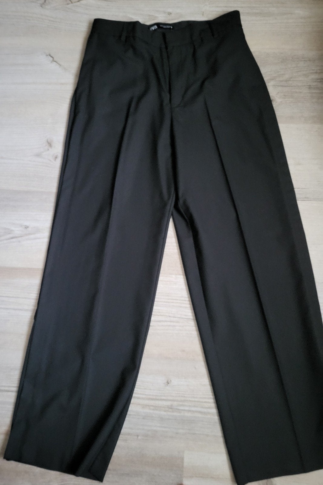 Zwarte dames pantalon met split onderaan de pijp, maat M, Ophalen of Verzenden, Zo goed als nieuw, Zwart, Lang