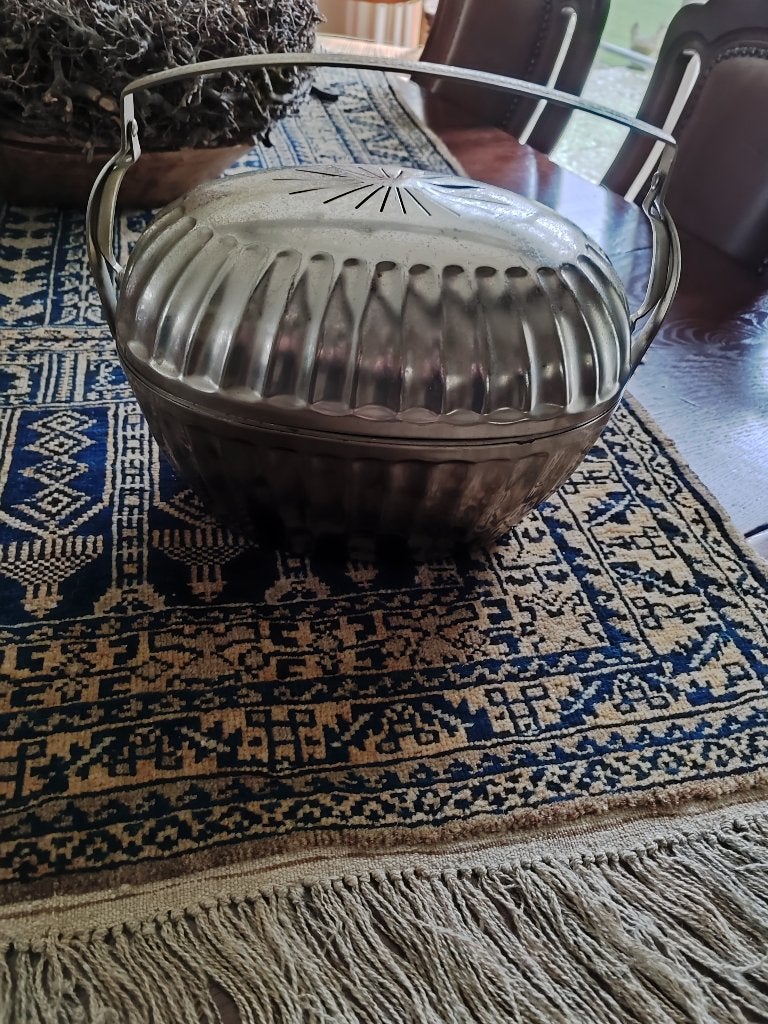 Antieke theemuts Metawa, Ophalen