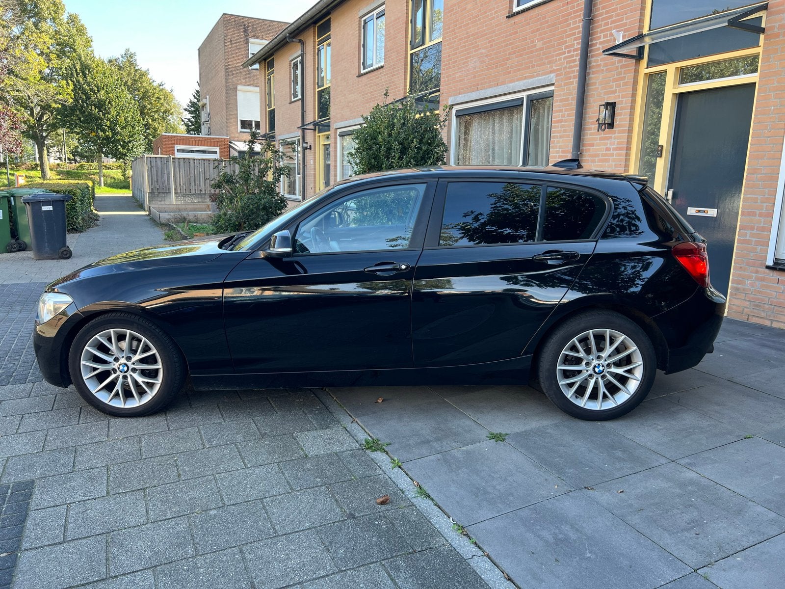 BMW 1-Serie 116I 100KW 5DR Aut8 2012 Zwart, 4 cilinders, Zwart, Origineel Nederlands, 1200 kg