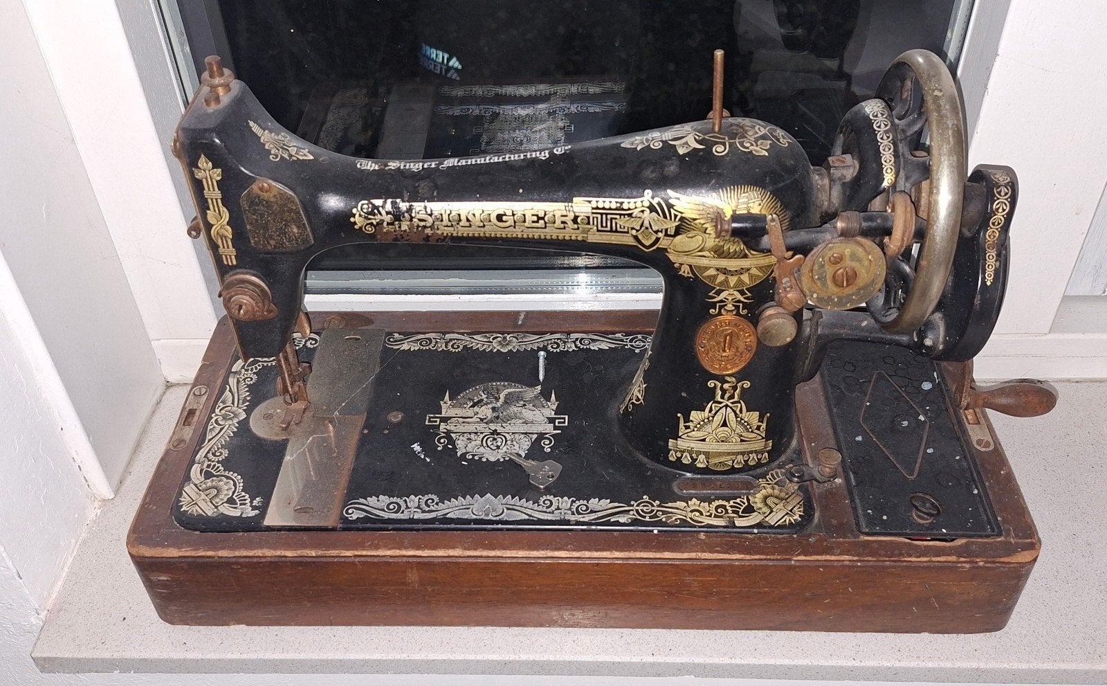Antieke Singer Naaimachine met Serienummer Y2341231, Ophalen