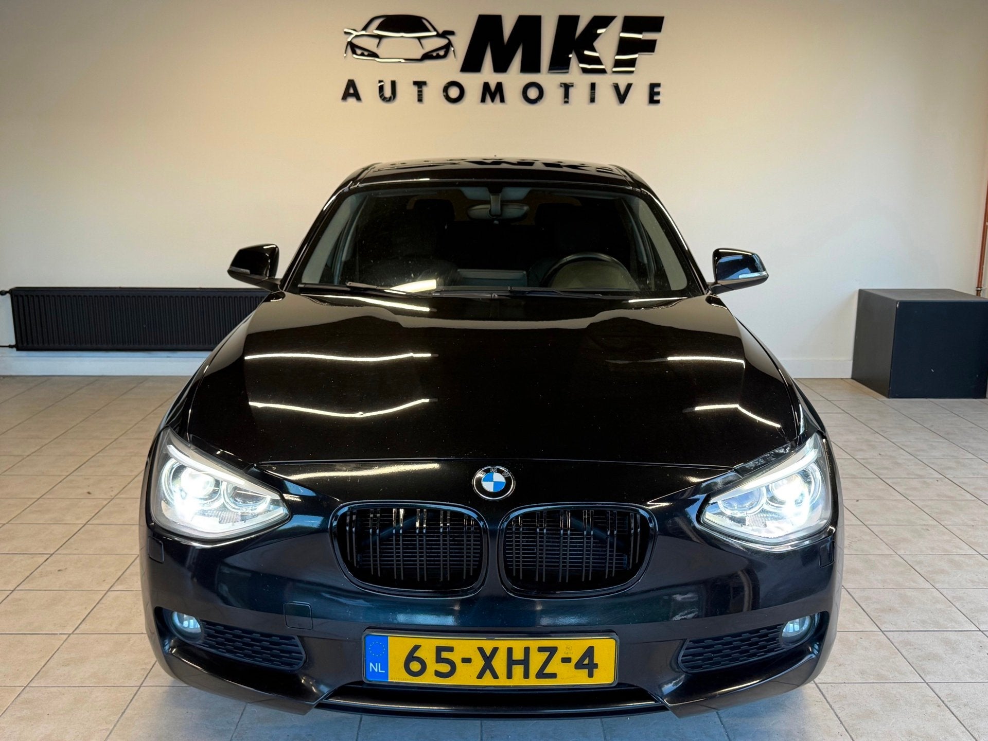 Foto 6 van BMW 1-serie 116D Business 2012 Zwart AIRCO|NAVI|XENON|NAP!