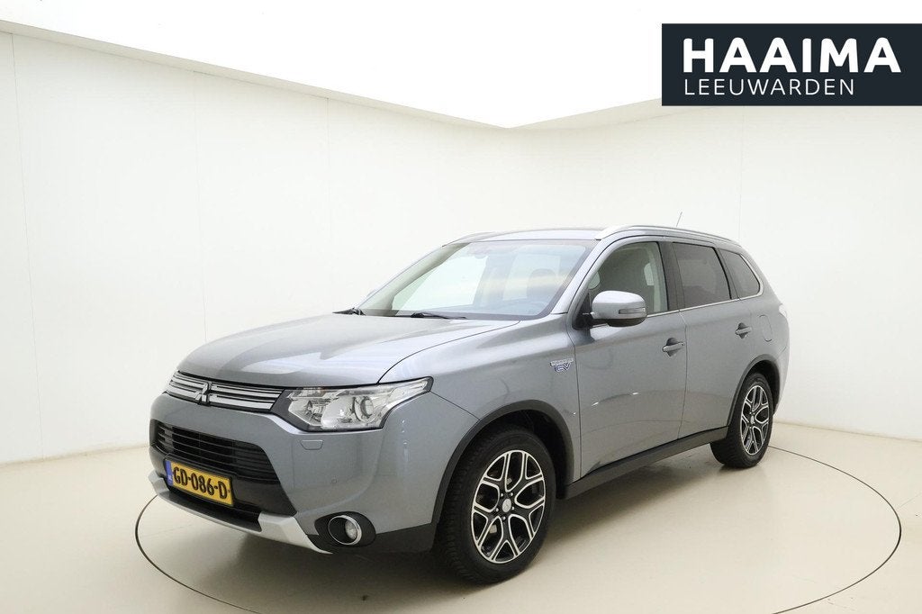 Mitsubishi Outlander 2.0 PHEV Executive Edition X-Line Autom, Auto's, Mitsubishi, 1998 cc, 4 cilinders, Leder en Stof, Bedrijf