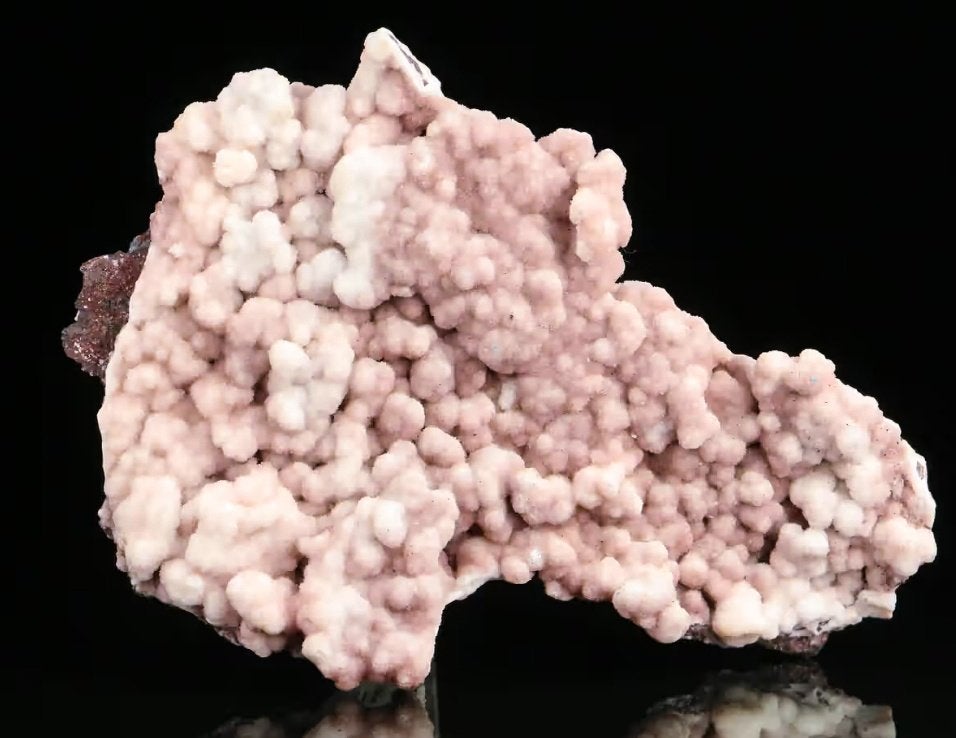 Witte/roze/lichtbruine CALCIET bolletjes UV op matrix ., Ophalen of Verzenden, Mineraal