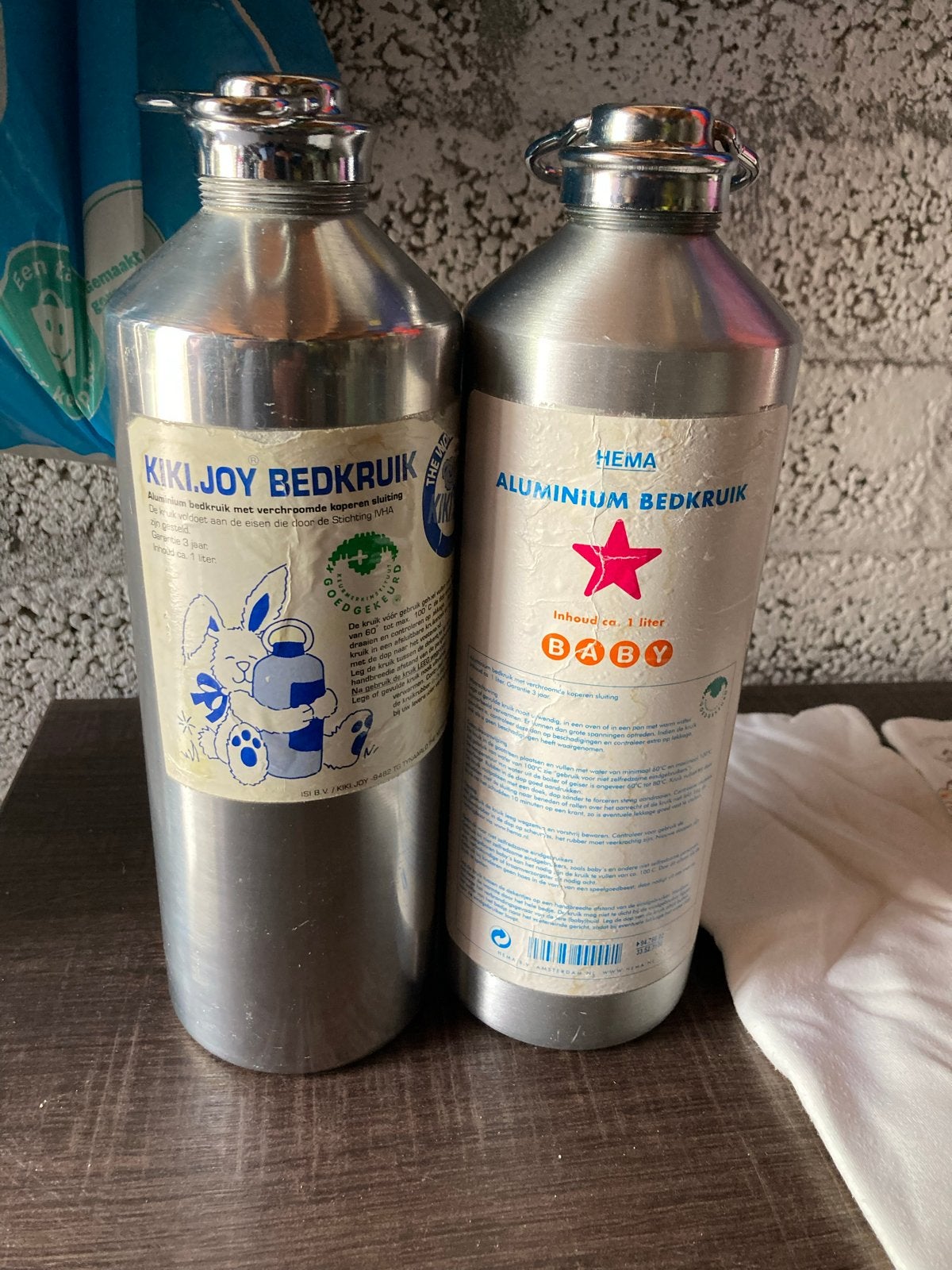 2 aluminium bedkruiken (Kiki Joy & Hema) met hoezen, Ophalen of Verzenden, Gebruikt