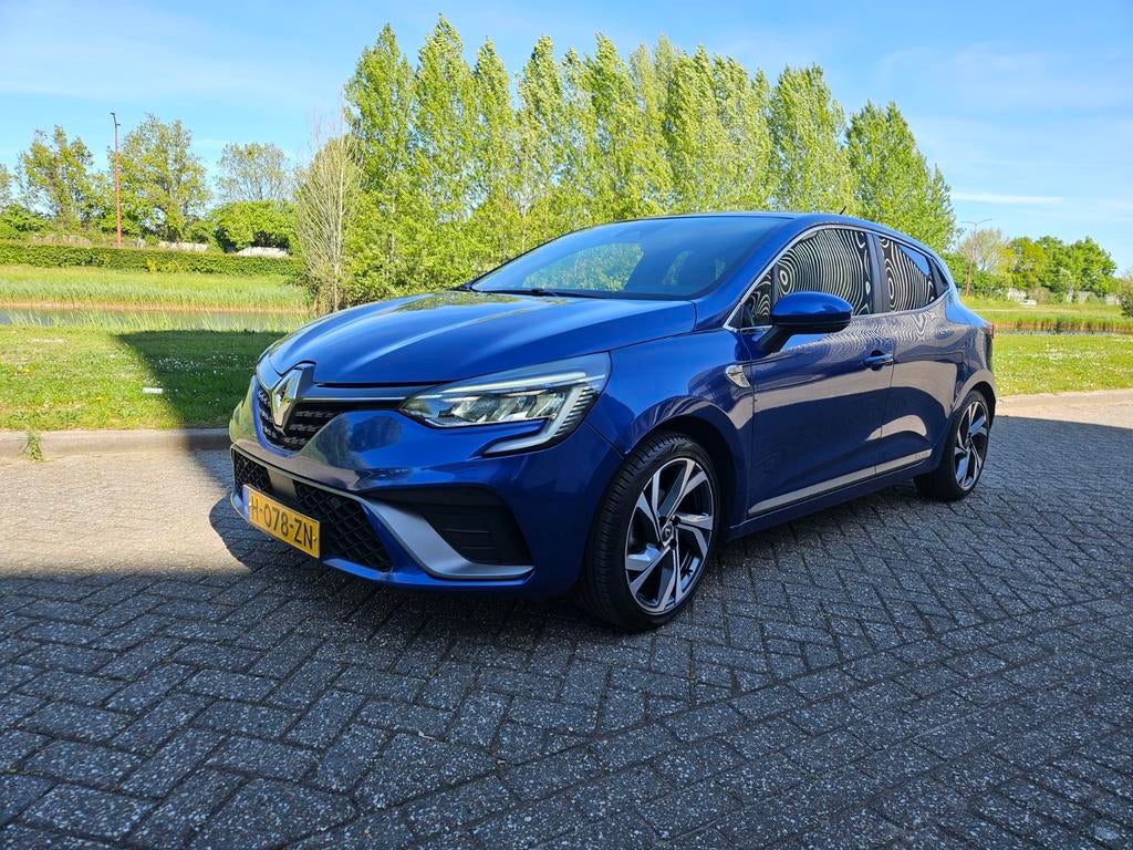 Renault Clio RS-line 1.0 TCe 100pk 17 inch LMV trekhaak BOSE, Voorwielaandrijving, Zwart, 580 kg, Blauw