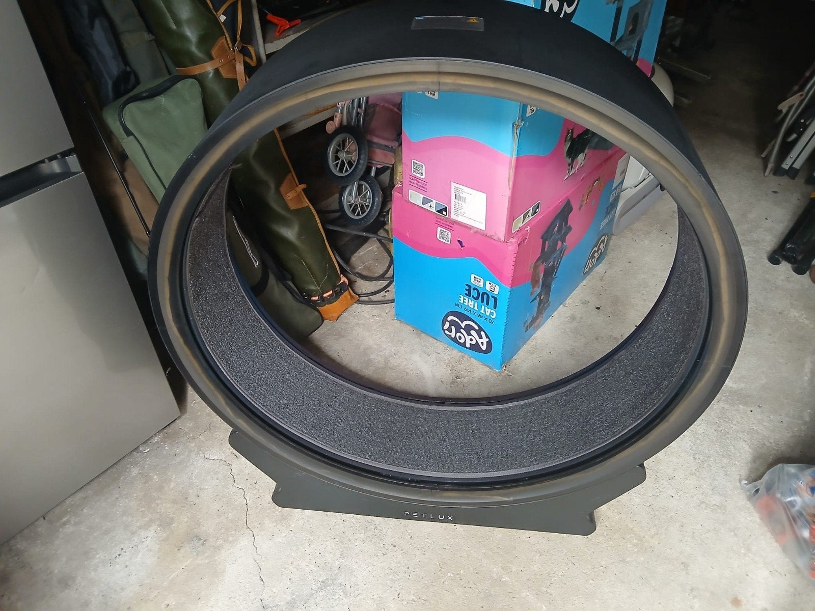 elektrische "loopband" krabpaal, Ophalen