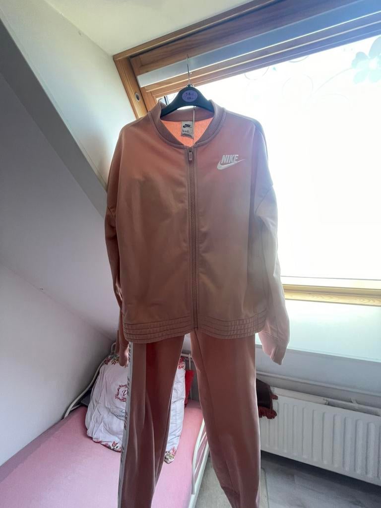 Roze Nike pak, Ophalen of Verzenden, Zo goed als nieuw, Roze, Maat 46/48 (XL) of groter