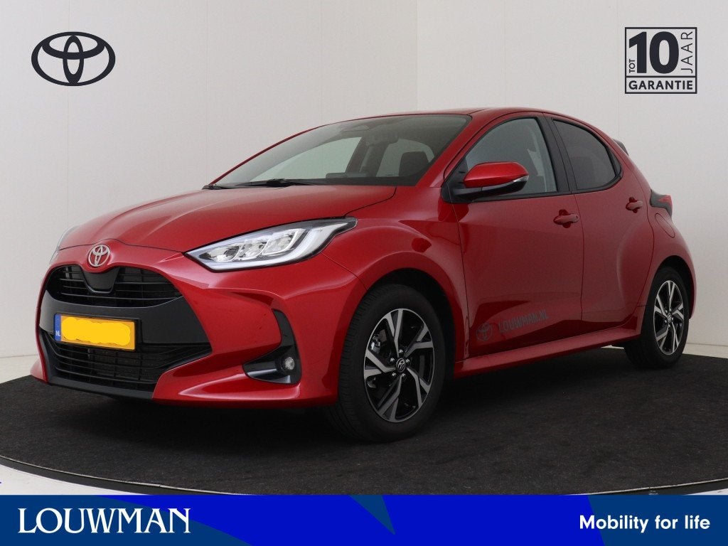 Toyota Yaris 1.5 Hybrid 115 Dynamic | Rijklaar | Navi | Crui, Auto's, 12 maanden, Zwart, Nieuw, Hybride Elektrisch/Benzine