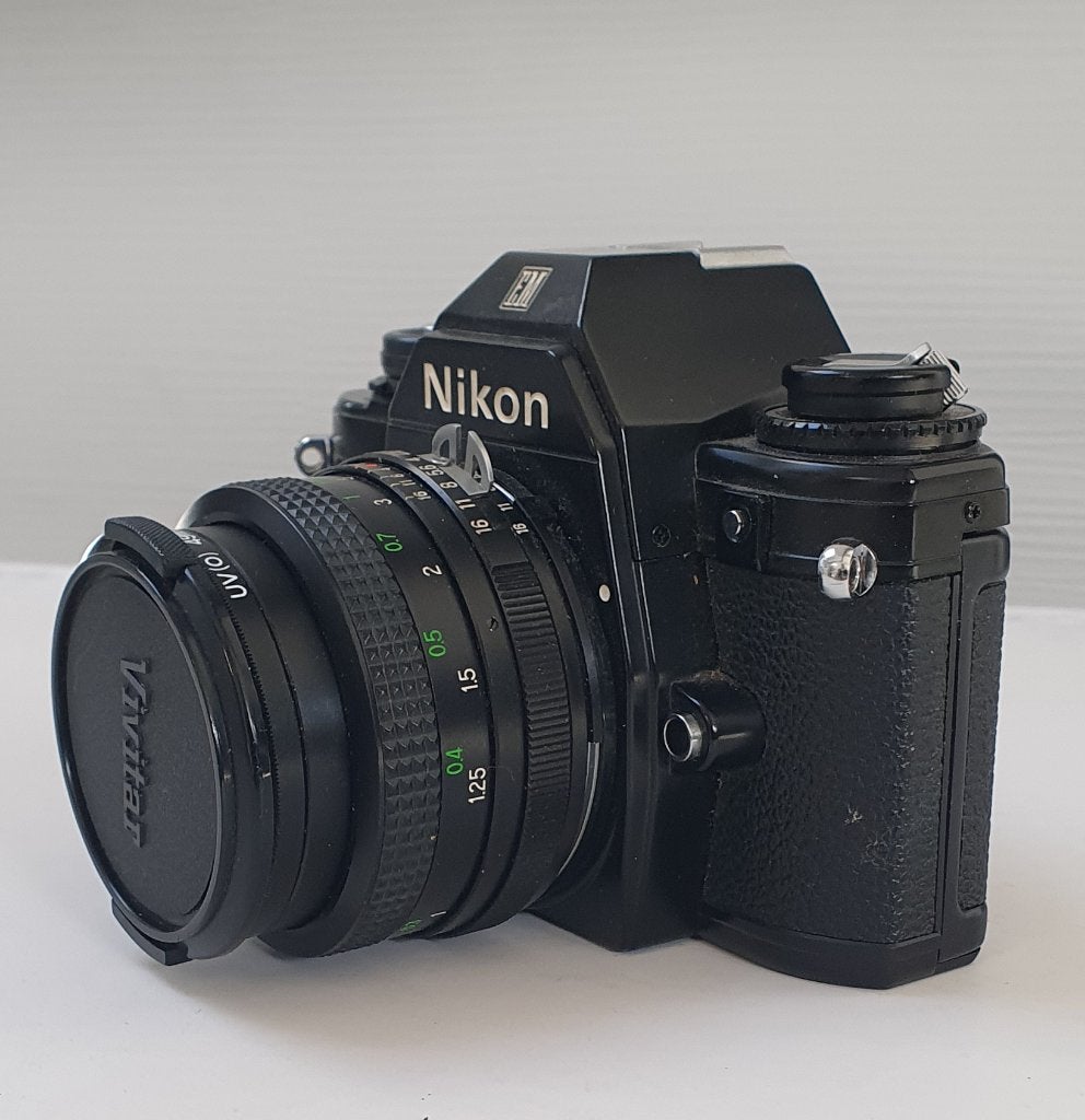 Nikon EM spiegelreflex + Vivitar 28mm groothoek, Ophalen of Verzenden, Gebruikt, Spiegelreflex, Nikon