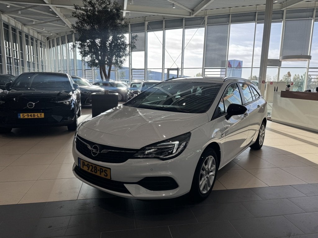 Opel Astra Sports Tourer 1.2 Edition, Auto's, Gebruikt, Euro 6, 1199 cc, Wit