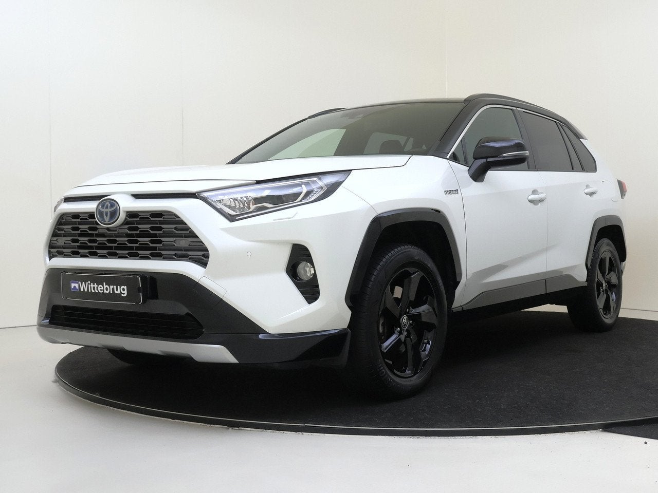Toyota RAV4 2.5 Hybrid Bi-Tone (bj 2019, automaat), Auto's, Toyota, Automaat, Gebruikt, 4 cilinders, 218 pk