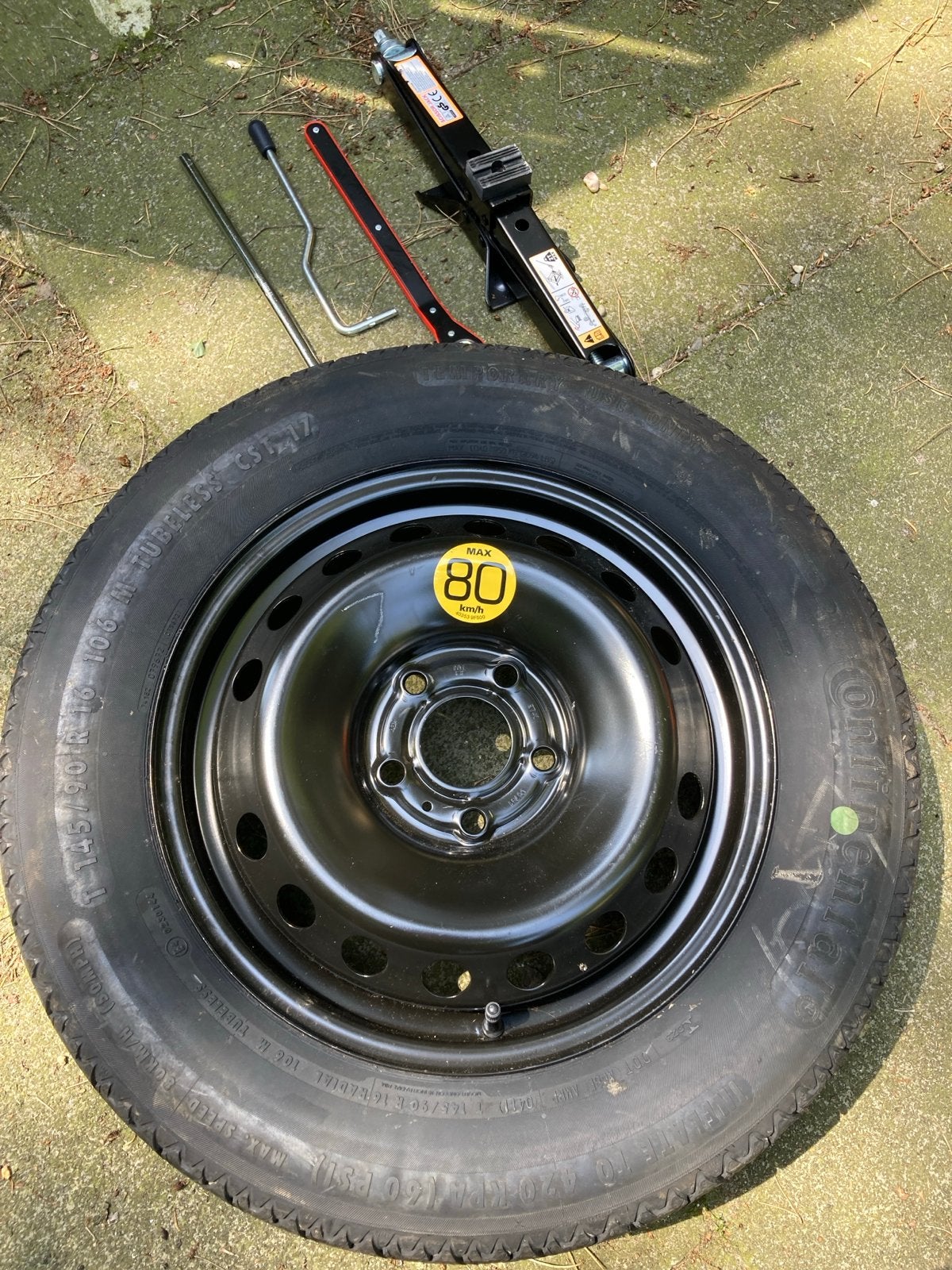 Continental thuiskomer met krikset en hoes, Gebruikt, 145 mm, 16 inch, Banden en Velgen