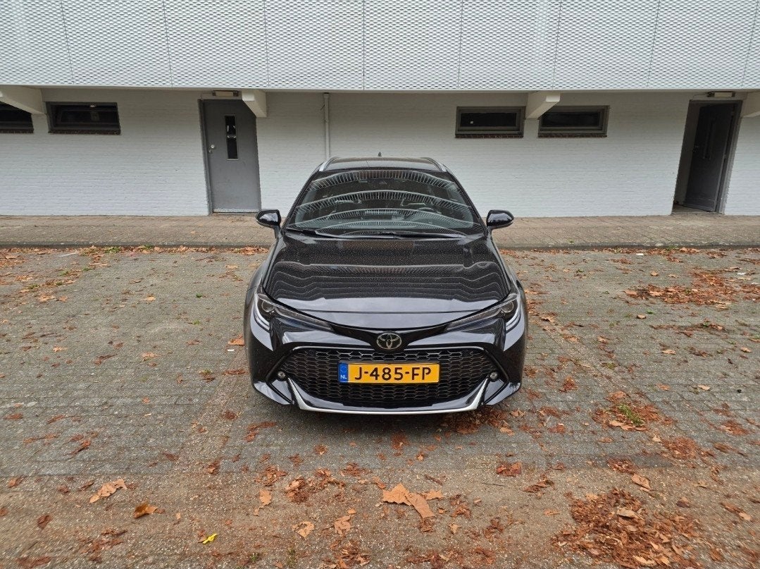 Toyota Corolla TS 1.8 Hybrid 122pk CVT 2020 Zwart, Auto's, 450 kg, 750 kg, Zwart, Stationwagon