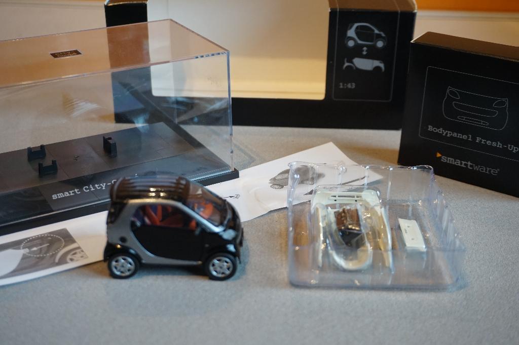 Smart City coupe1998 Herpa = 1/43, Ophalen of Verzenden, Zo goed als nieuw, Auto, Overige merken