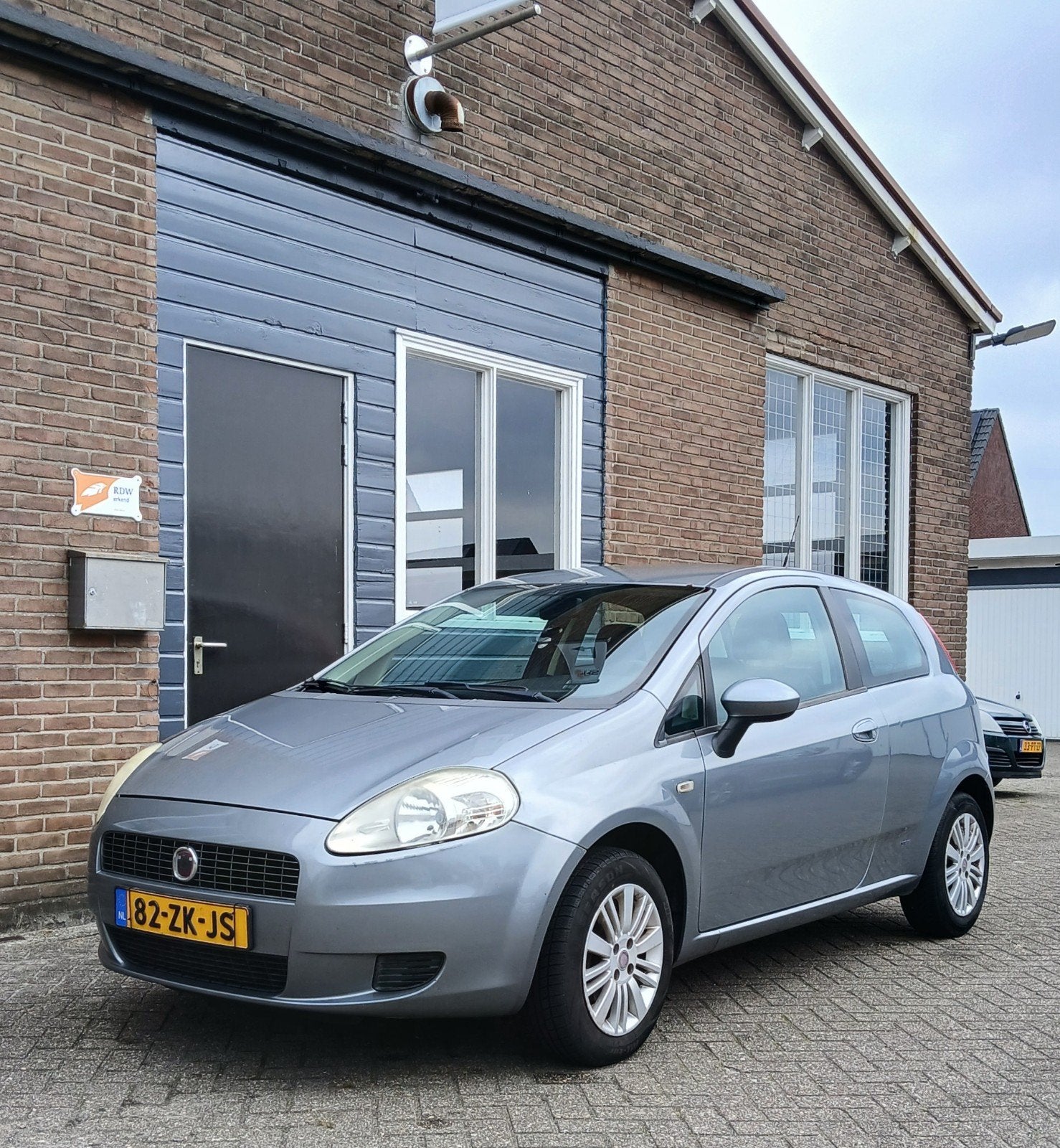 Fiat Grande Punto 1.4 Dynamic / Cruise Control /NW koppeling, Auto's, Fiat, Voorwielaandrijving, Stof, 40 €/maand, Zwart