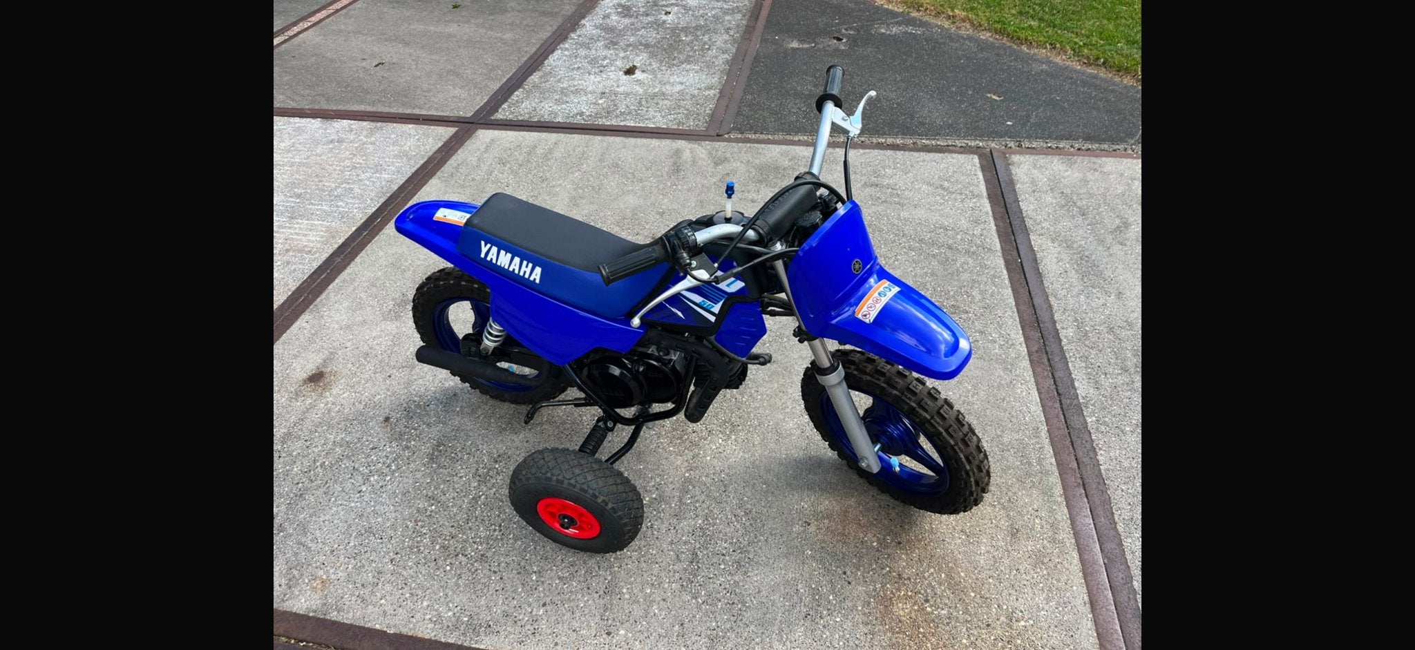 Yamaha PW50 2025 Crossmotor met zijwieltjes en bescherming, Gebruikt, Particulier, Crossmotor, 11 kW of minder