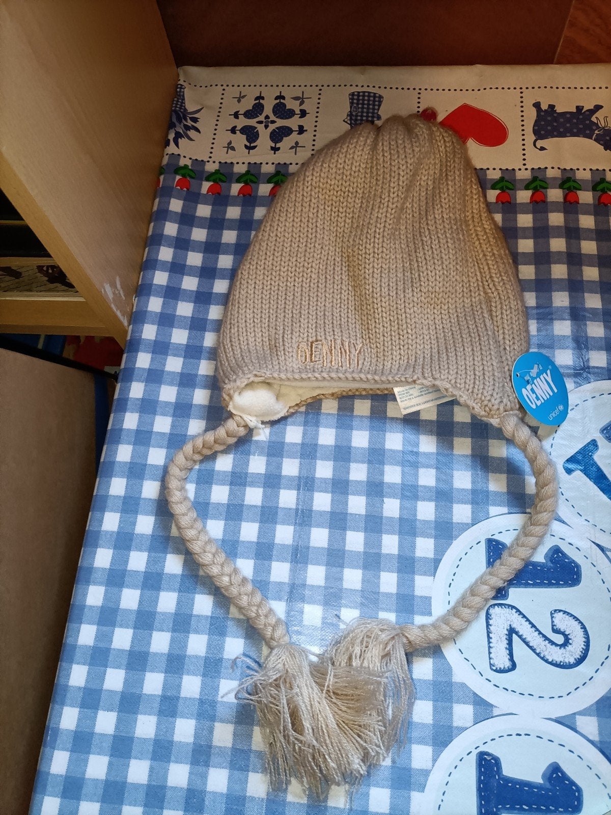 Muts van Oenny Unicef Nieuw met kaartje, Ophalen of Verzenden, Nieuw, Jongen of Meisje, Muts