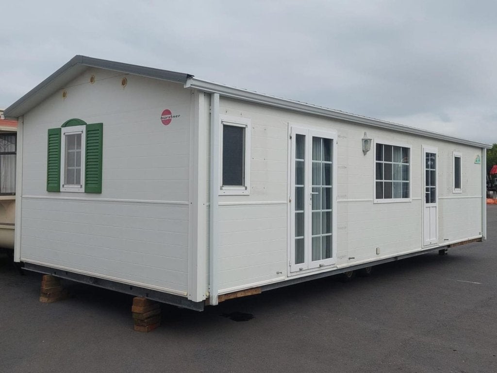Winterhard middenkamer chalet met 2 slaapkamers, Caravans en Kamperen