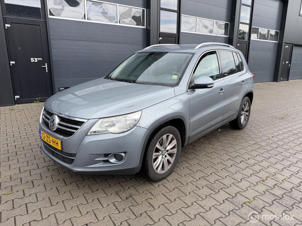 Volkswagen Tiguan 1.4 TSI Trend&Fun 4Motion, Auto's, Gebruikt, Electronic Stability Program (ESP), 4 cilinders, Origineel Nederlands