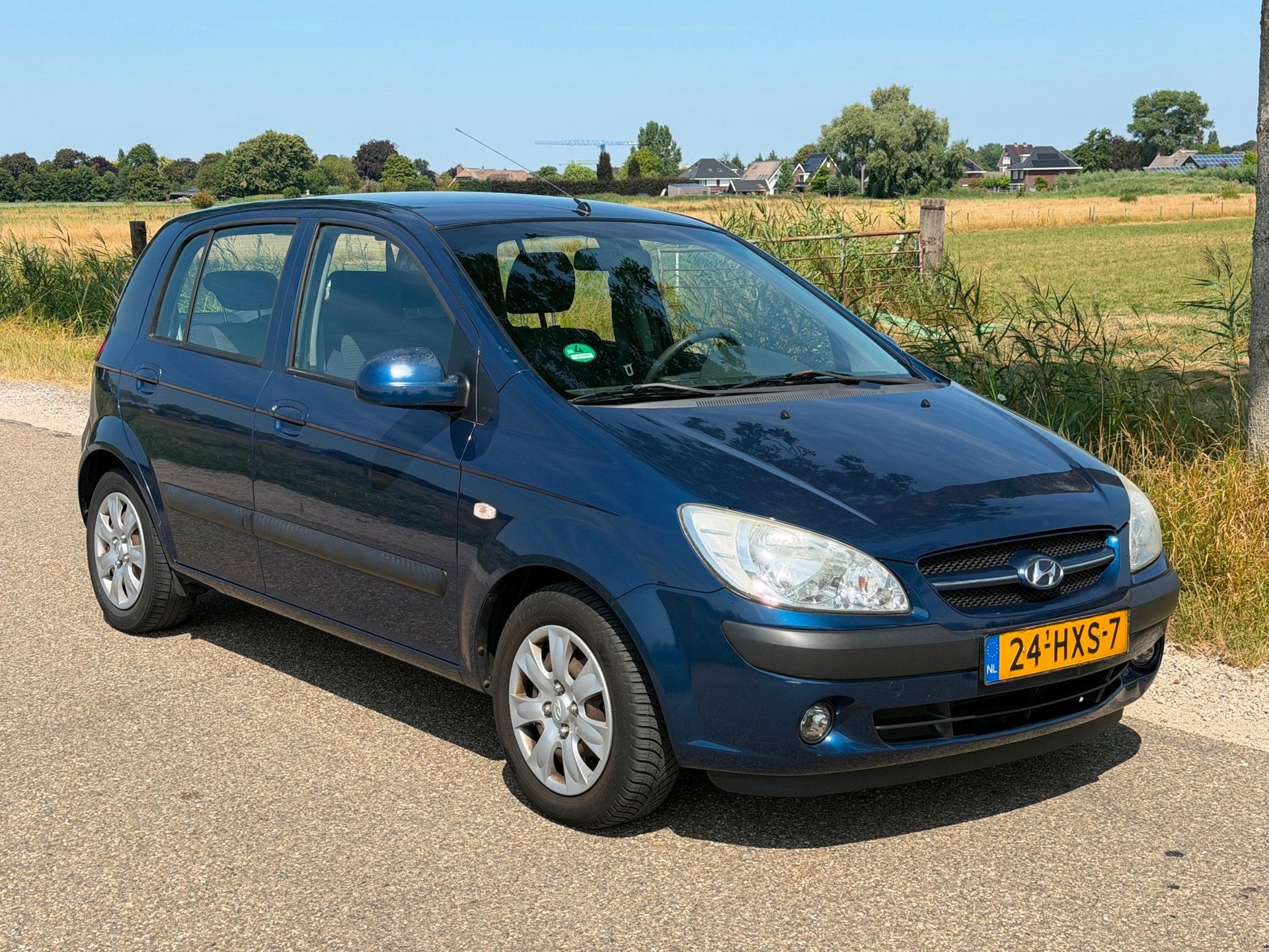 Hyundai Getz 1.4i Active Cool APK 10-2027 Airco NAP, Auto's, Hyundai, Voorwielaandrijving, Zwart, 4 cilinders, Blauw