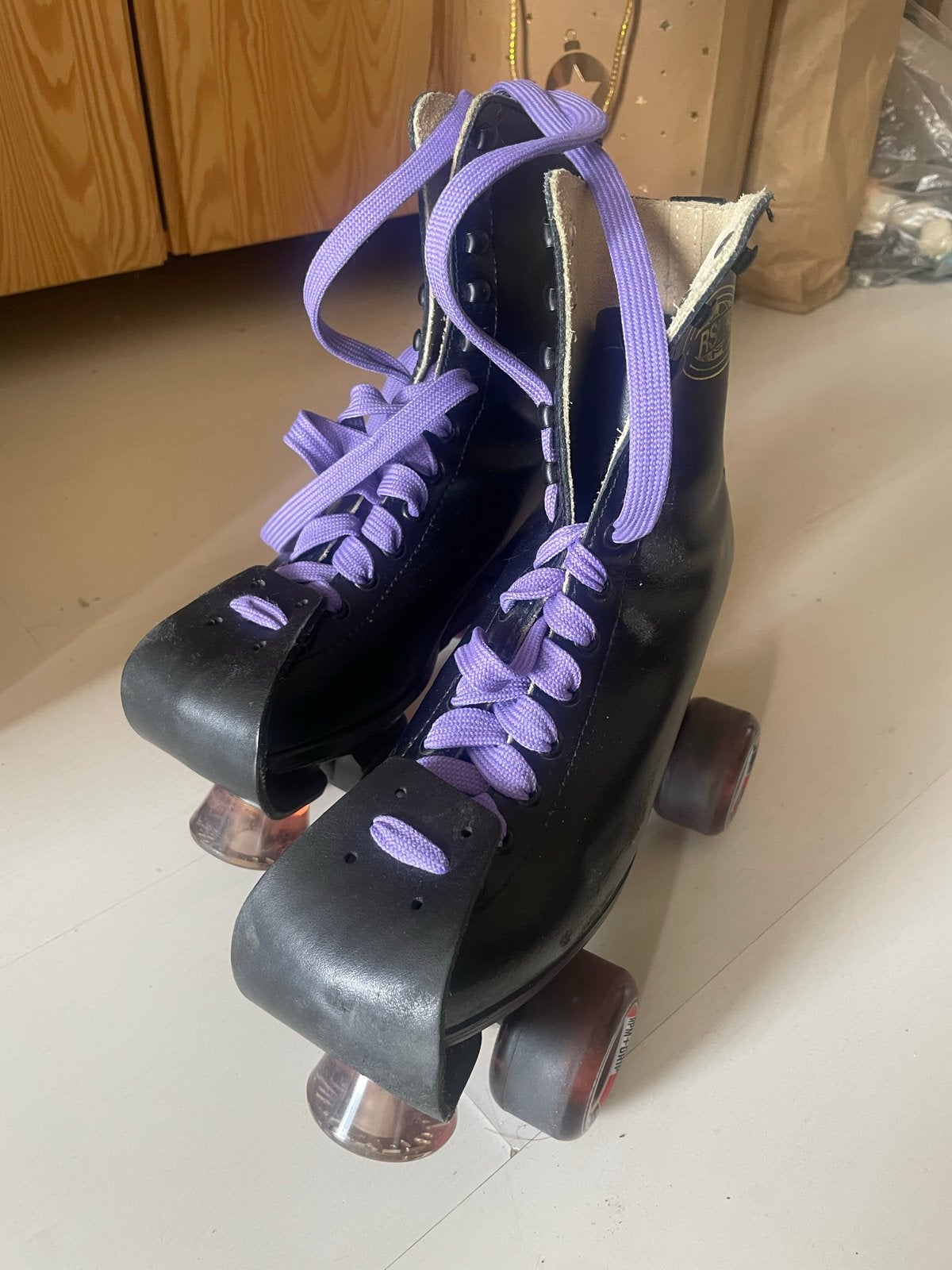Zwarte rolschaatsen met paarse veters van RSI maat 39, Ophalen, Gebruikt, Overige typen