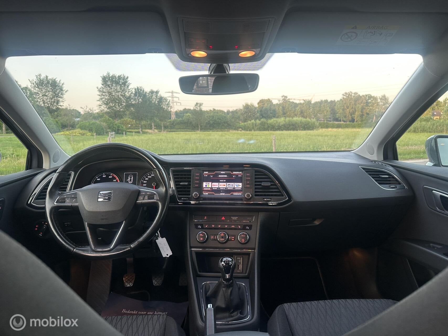 Seat Leon 1.2 TSI Style Business Trekhaak Cruise Airco✅, Auto's, Voorwielaandrijving, Dealer onderhouden, Stof, Gebruikt