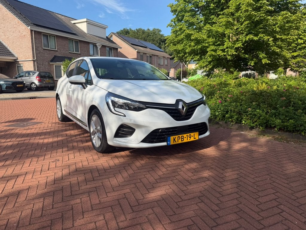 Renault Clio 1.6 E-tech Hybrid 140pk 2022 Wit, Auto's, Stof, Wit, Bedrijf, Hybride Elektrisch/Benzine
