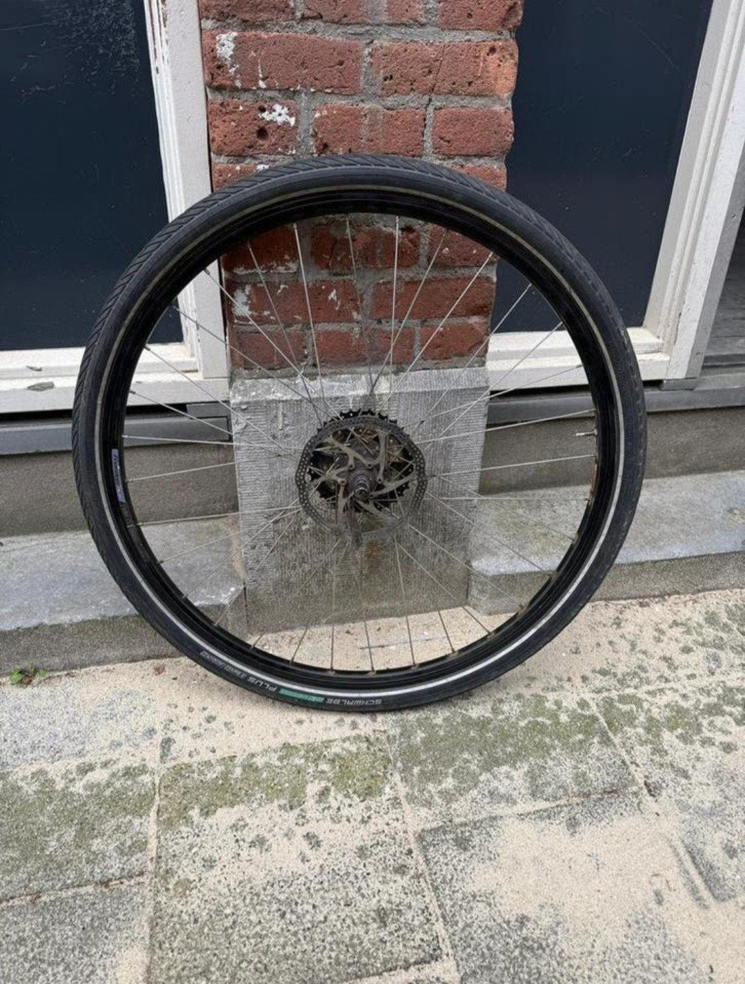 achterwiel 28 inch met schijfrem en 10 speed casette, Fietsen en Brommers, Fietsonderdelen, Zo goed als nieuw, Aluminium, Shimano