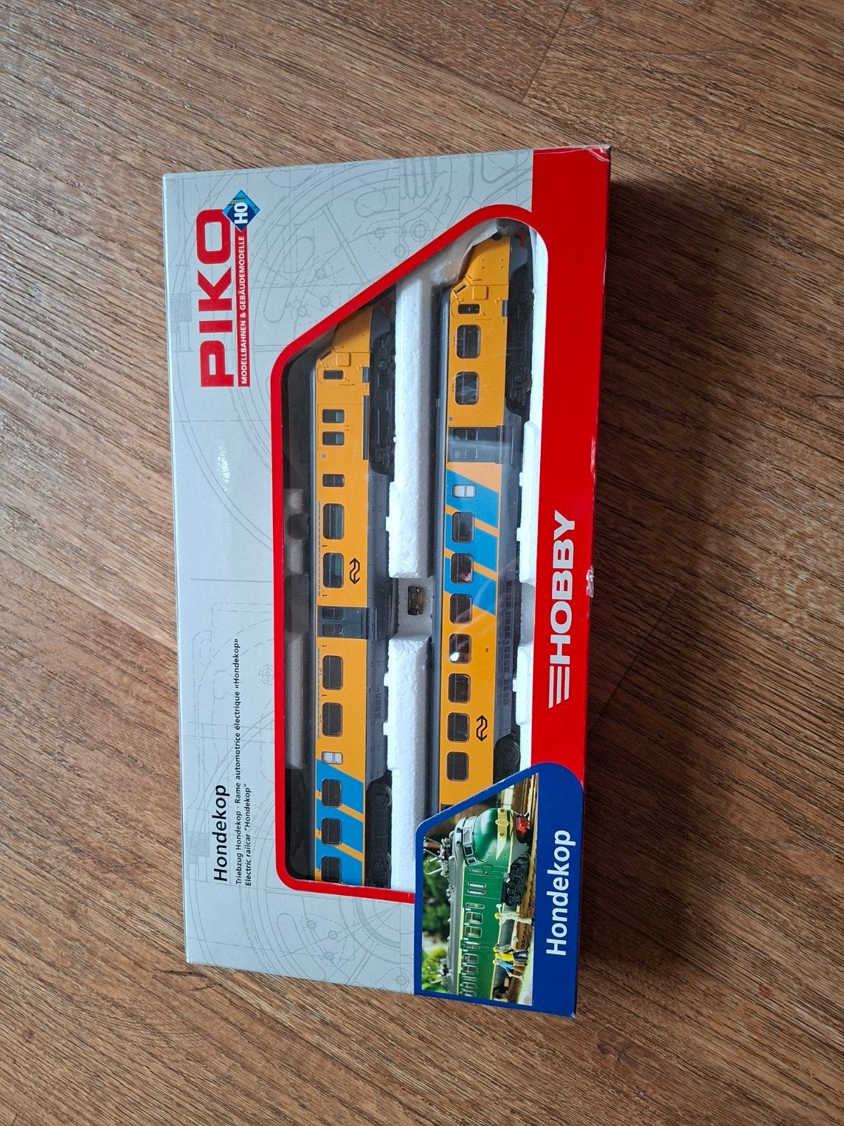 Piko Hondekop 57521 met passagiers, perfecte staat, Ophalen of Verzenden
