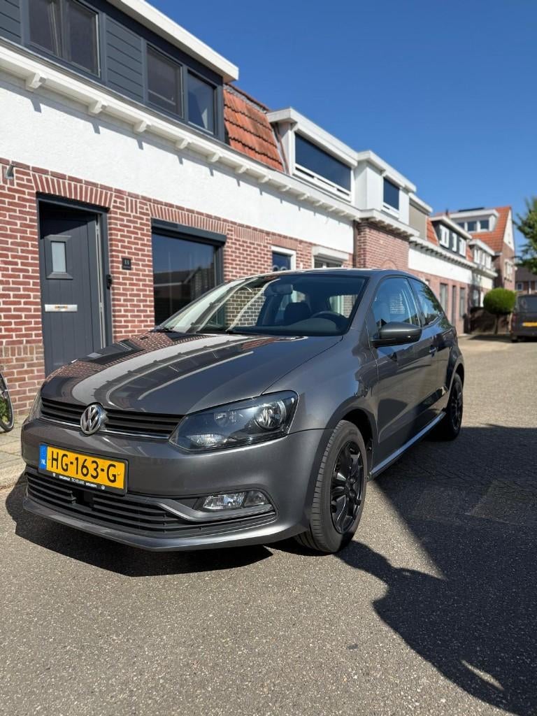 Volkswagen Polo 1.2 TSI 66KW 2014 Grijs, Auto's, Stof, 40 €/maand, 4 cilinders, Handgeschakeld