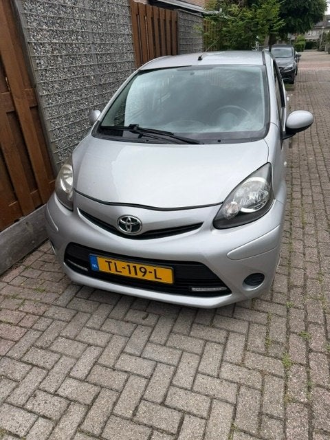 Toyota Aygo 1.0 12V Vvt-i 5DRS 2014 Grijs, Auto's, Stof, 4 stoelen, 68 pk, Grijs