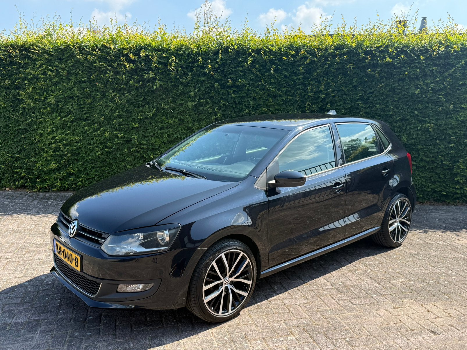 Volkswagen Polo 1.4 16V FSI 63KW 2009 Zwart, Voorwielaandrijving, 970 kg, Stof, 40 €/maand