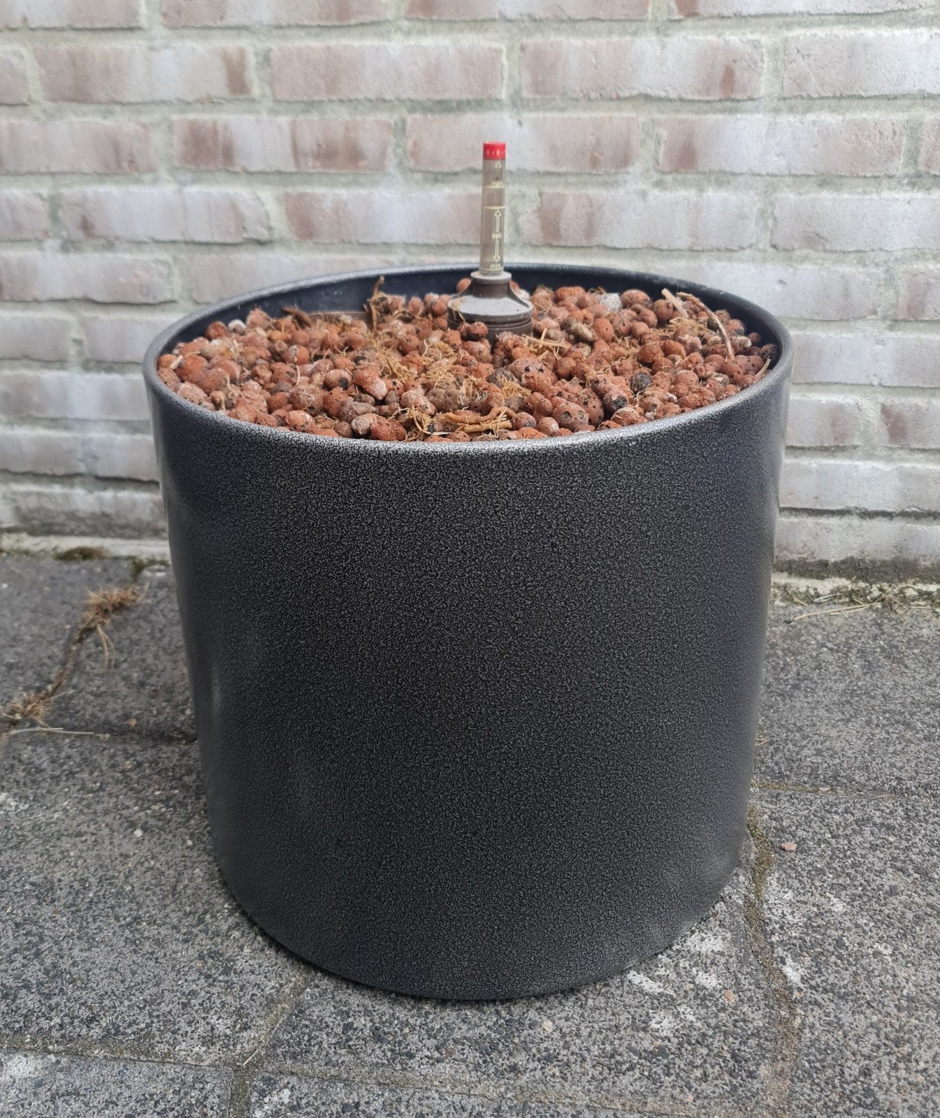 Plantenbak rond antraciet met zilver metaal op 3 wielen mooi, Ophalen, Kunststof, Gebruikt, Minder dan 60 cm