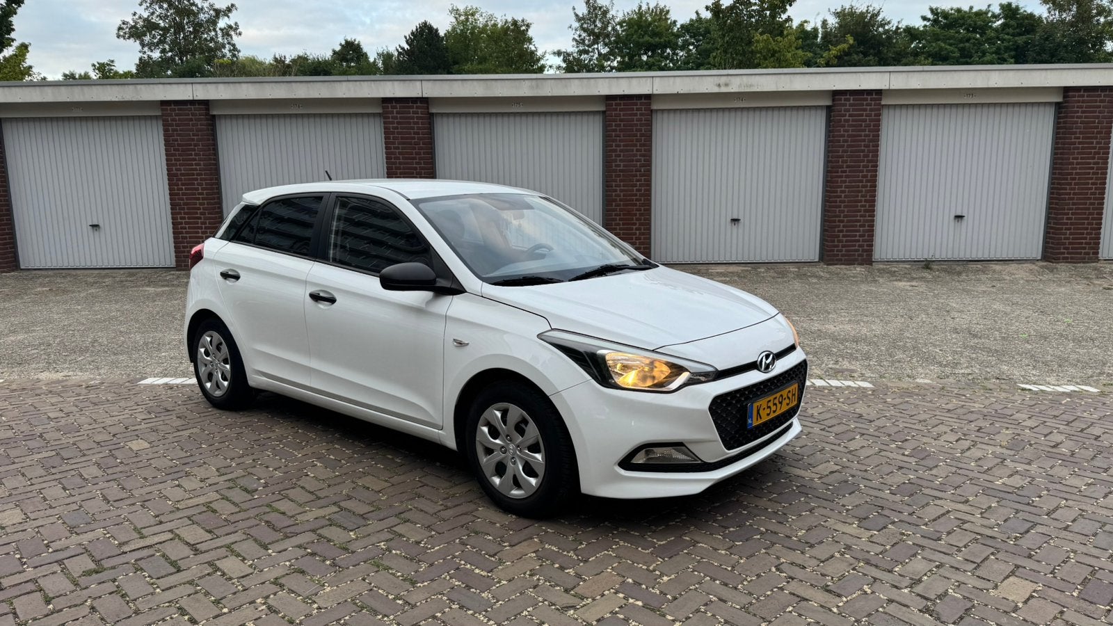 Hyundai i20 1.2 I 5-DRS 2015 Wit, Auto's, Hyundai, 4 cilinders, Wit, Handgeschakeld, Particulier