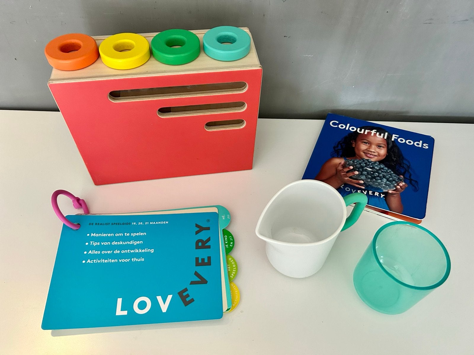Lovevery Speelgoedset: ringen spel, Boekje, kannetje & beker, Ophalen of Verzenden, Zo goed als nieuw, Overige typen