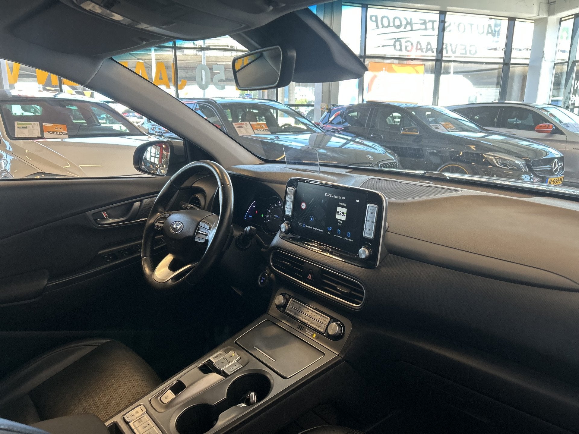 Hyundai KONA EV Premium 64 kWh Vol Elektrisch | Head up disp, Auto's, Gebruikt, Zwart, Met garantie (alle), 630 min