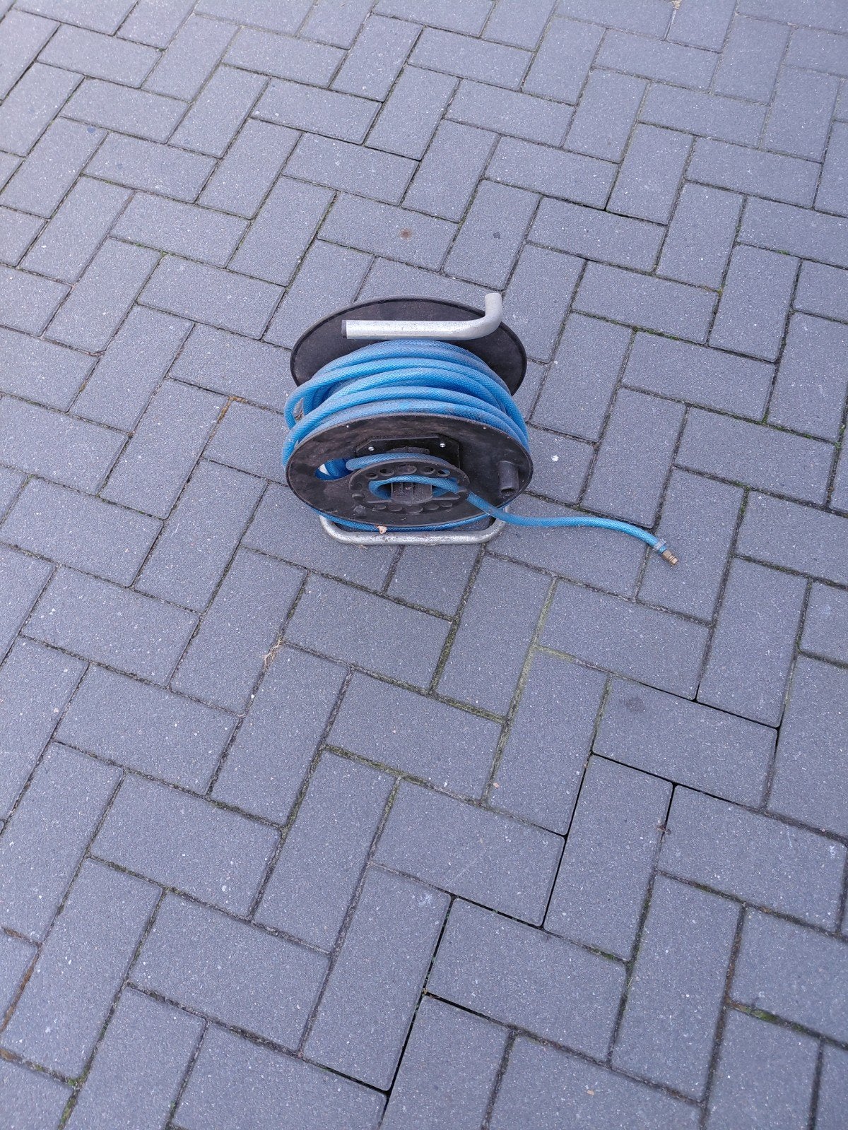luchtslang op haspel, Ophalen