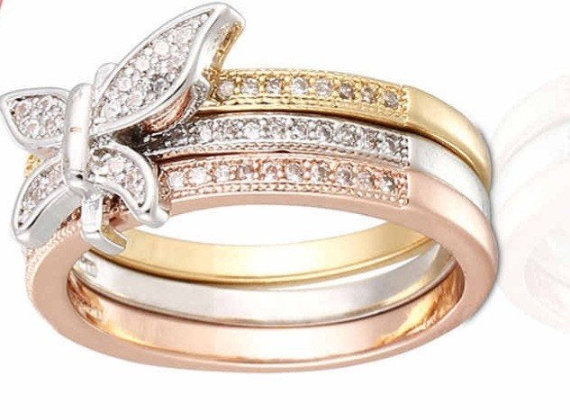Ring rosé zilver en goudkleurig met vlinder en steentjes, Overige kleuren, Ophalen of Verzenden, Zo goed als nieuw, Dame