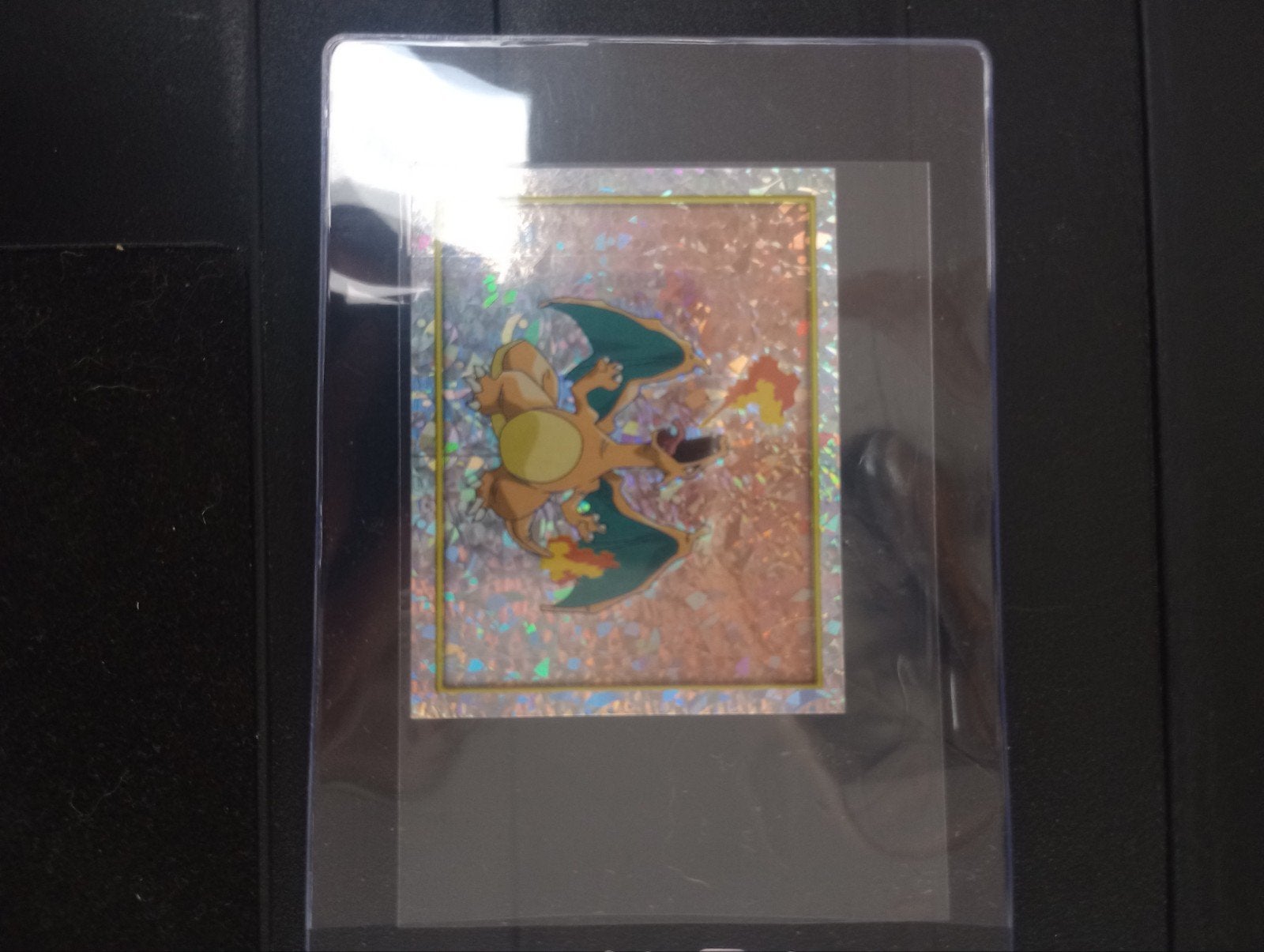 Zeldzame Pokémon Charizard Sticker (Merlin Online 2000), Ophalen of Verzenden, Zo goed als nieuw, Overige typen, Foil